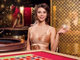 Live casino and slots sections of the Caesars platform shown on a mobile screen